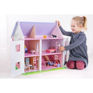 stort rosa dockhus i trä med möbler, dockor och husdjur. Kan öppnas i fronten och från taket